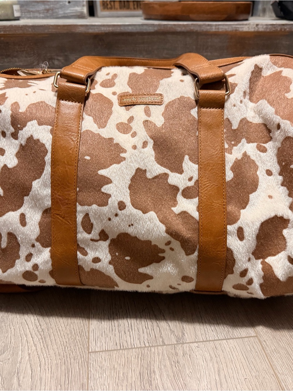 Simply Southern Brown & White Cowhide Pattern Duffel with Tan Straps